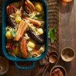 Choucroute Garnie, an Alsatian-inflected stew of braised sauerkraut satisfies devotees and converts skeptics.