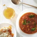 A tomato stew on a white background