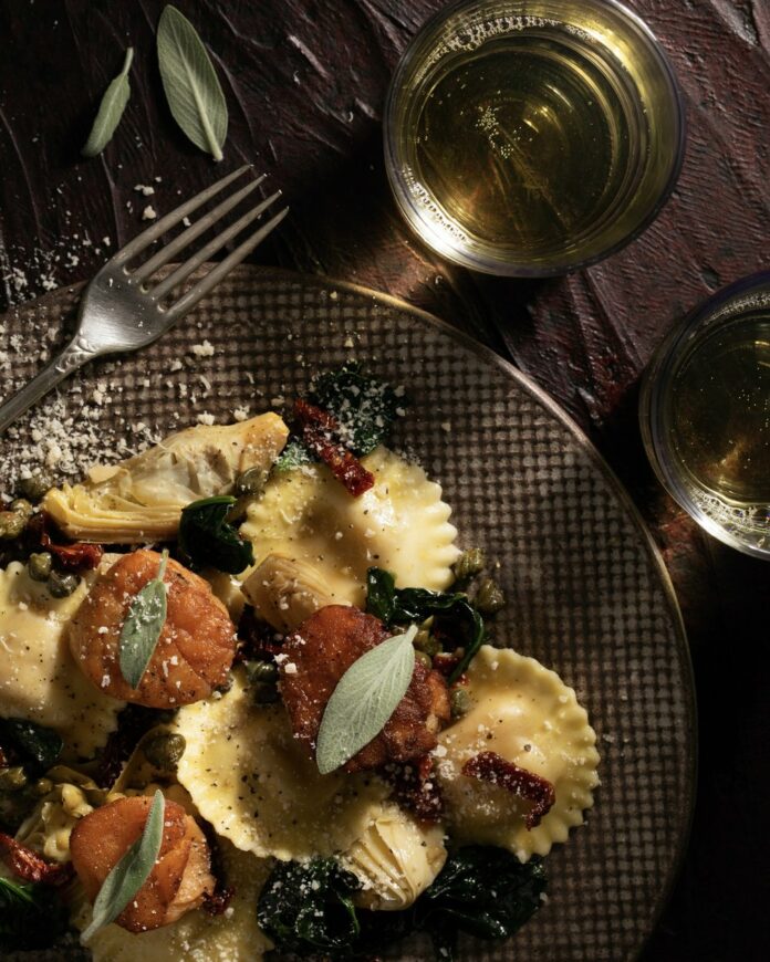 Ravioli+with+Sauteed+Veggies+and+Scallops+TABLE+Magazine Ravioli with sautéed vegetables and scallops served on a fine dining plate