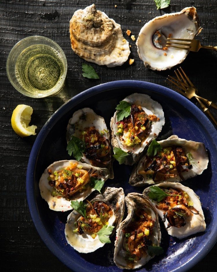 A roasted oyster dish with an impressive symphony of flavors and textures.