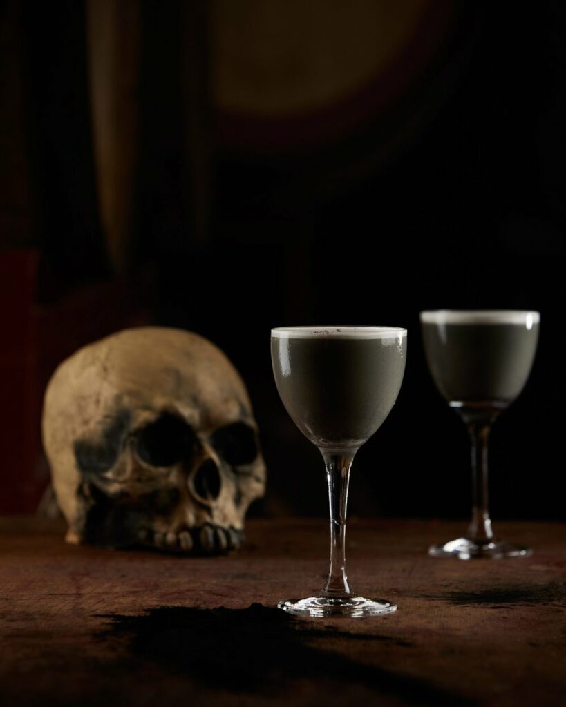 A complex, creamy cocktail with notes of anise and the haunting darkness of a moonless night.