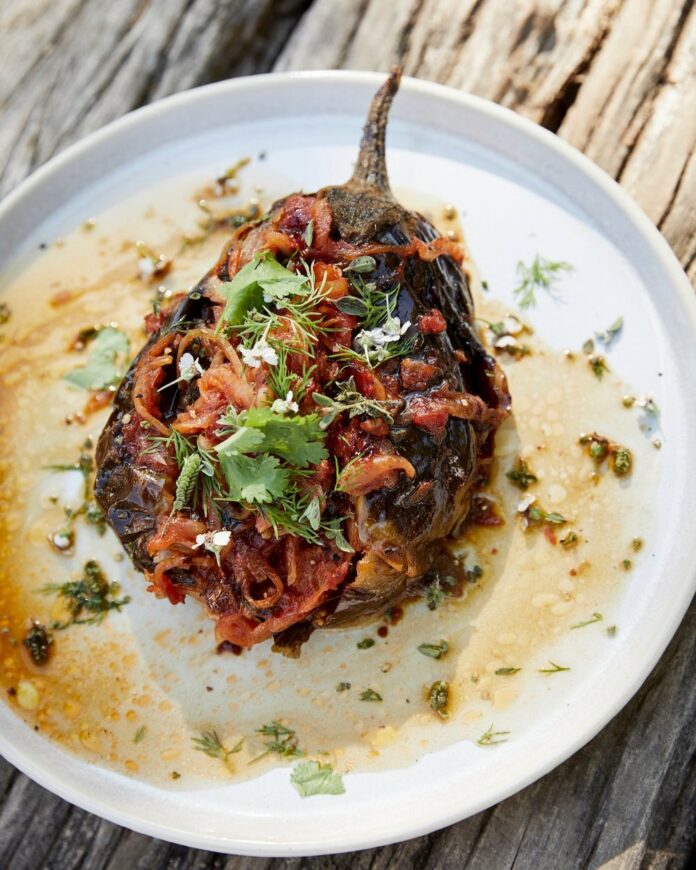An aerial view of Imam Bayildi sitting in a white dish.
