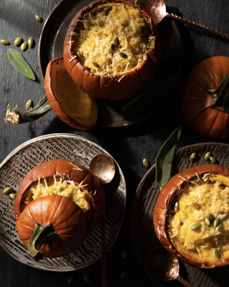That comfort of cool weather food is delivered with style in this creamy risotto recipe baked in pumpkins.