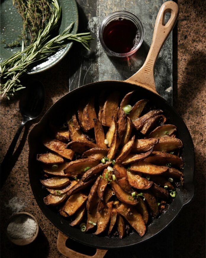Roasted+Potato+Venison+Shepherd's+Pie+TABLE+Magazine A Roasted Potato Venison Shepherd’s Pie displayed in a cast iron pan.