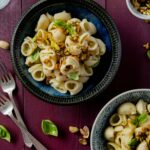a bowl of tortellini pasta with Zucchini Pasta Sauce