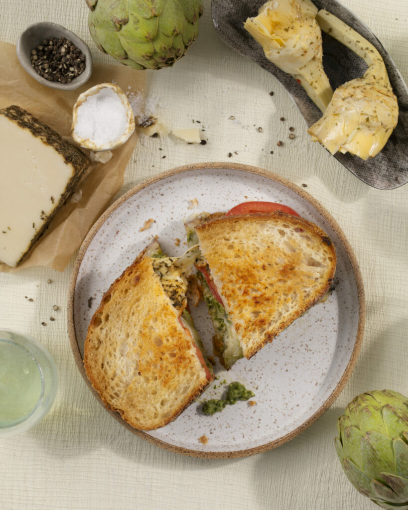 A Goat Rodeo grilled cheese sandwich on a plate.