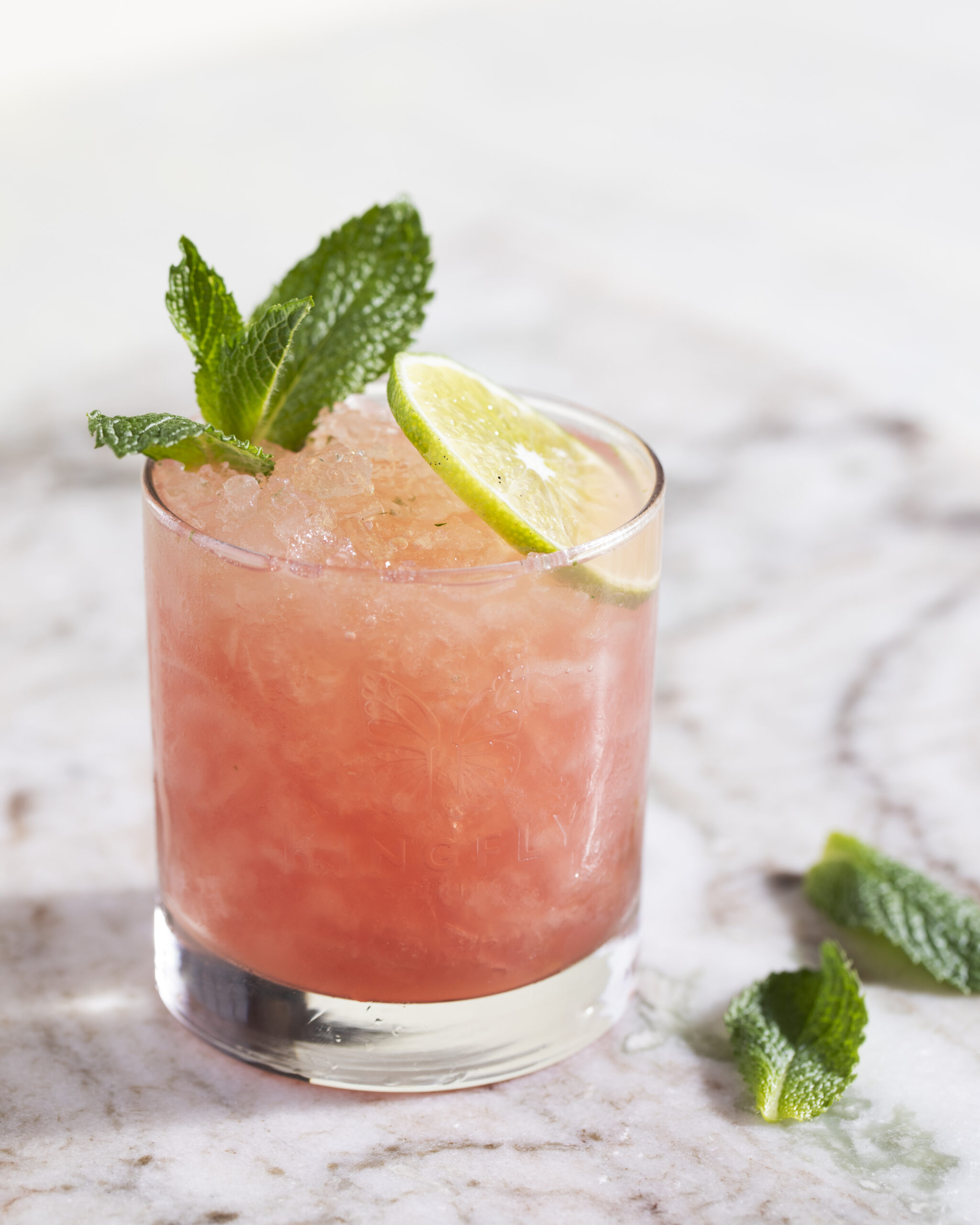 Pink liquid makes up this cocktail, a lighter, brighter, super refreshing version of a mint julep.