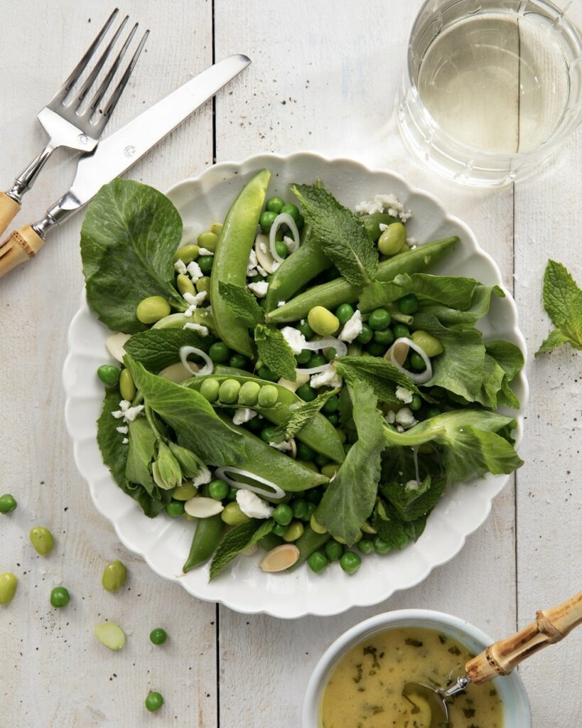 a variety of green spring peas in a beautiful spring pea salad