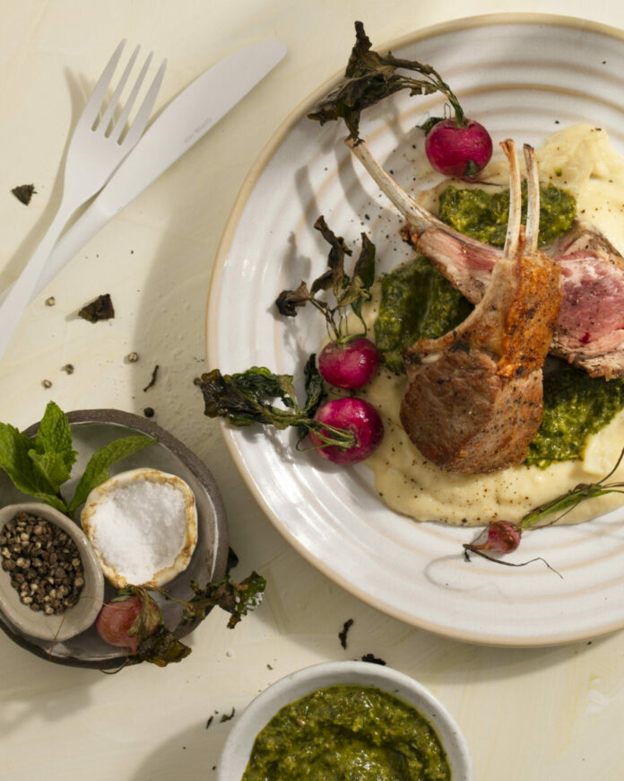 A plate of spring lamb chops with smoky roasted radishes.