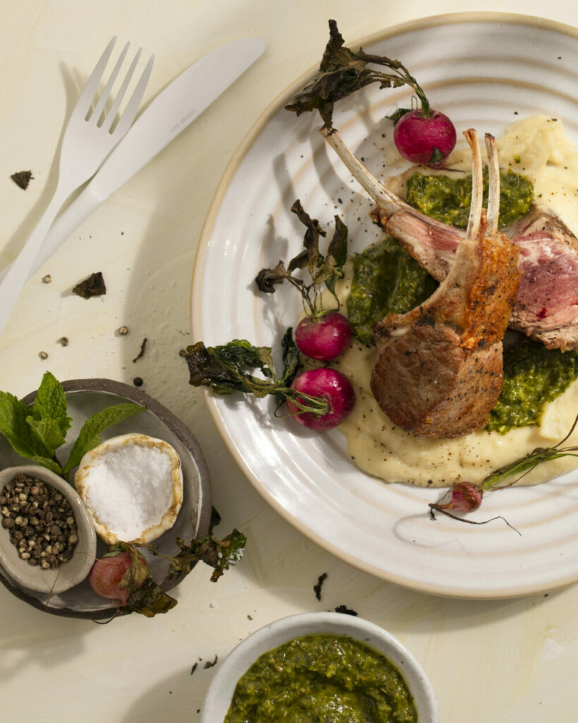 A plate of spring lamb chops with smoky roasted radishes.