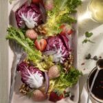 A strawberry salad with rhubarb in it.