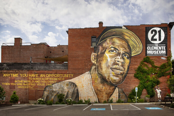 An image of the Roberto Clemente mural on the side of the Clemente Museum.