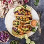 Squash Tacos sitting on a white plate