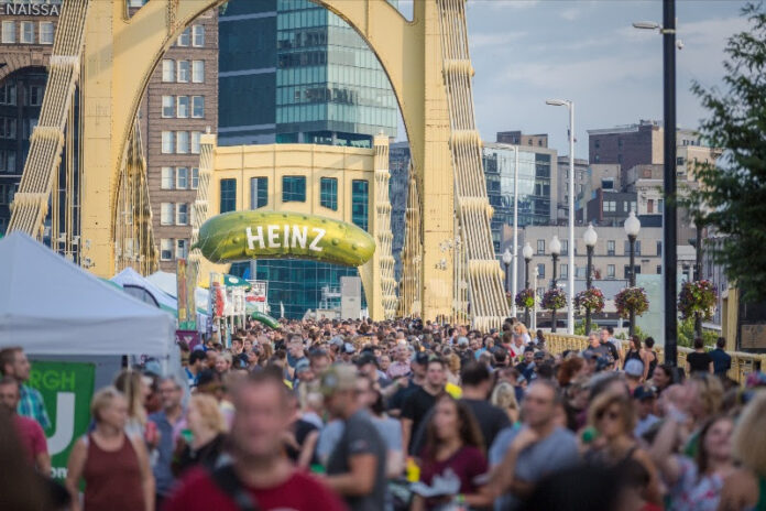 Crowds gather at Picklesburgh, a holiday recommendation by YaJagoffs! Rachael Rennebeck and John Chamberlin