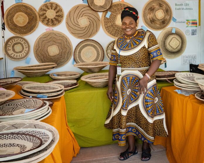 Artist with handmade baskets, Santa Fe’s Summer Markets