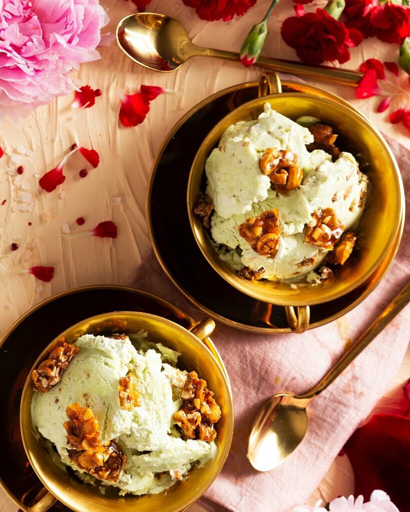 Hazelnut Avocado Semi-Freddo served on two different bowls, which are placed on pans