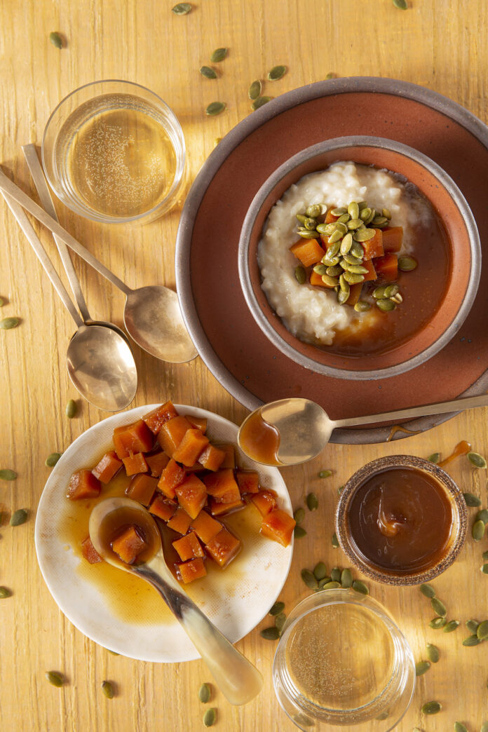 Rice Pudding with Candied Pumpkin and Caramel Recipe Rice Pudding with Candied Pumpkin and Caramel sits in an orange and brown bowl. Bowls of candied pumpkin, and caramel sit below the pudding. Rice Pudding recipe
