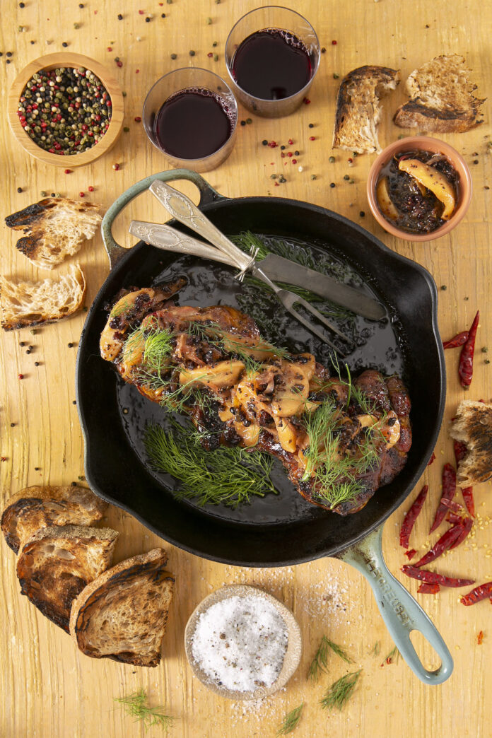 Braised lamb with quince mostarda recipe Braised lamb sits in a cast iron skillet topped with Mostarda Mantovana