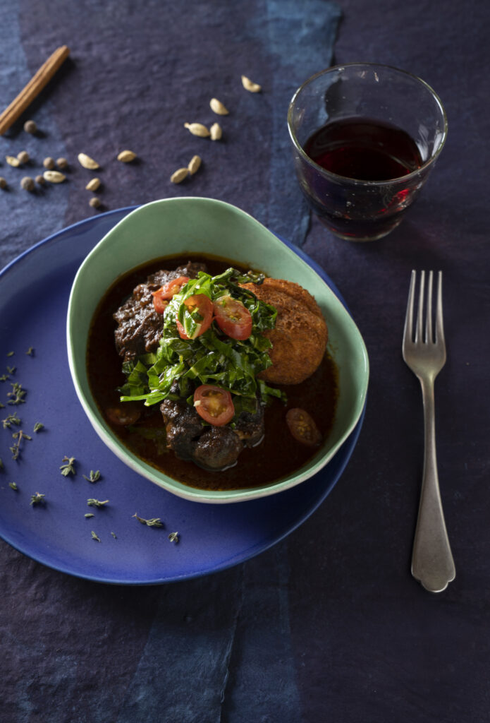 Slow-Cooked Oxtail Dish with Jamaican Jerk Seasoning, Rosemary, Thyme, and Cinnamon. Santa Fe Wine & Chile Fiesta