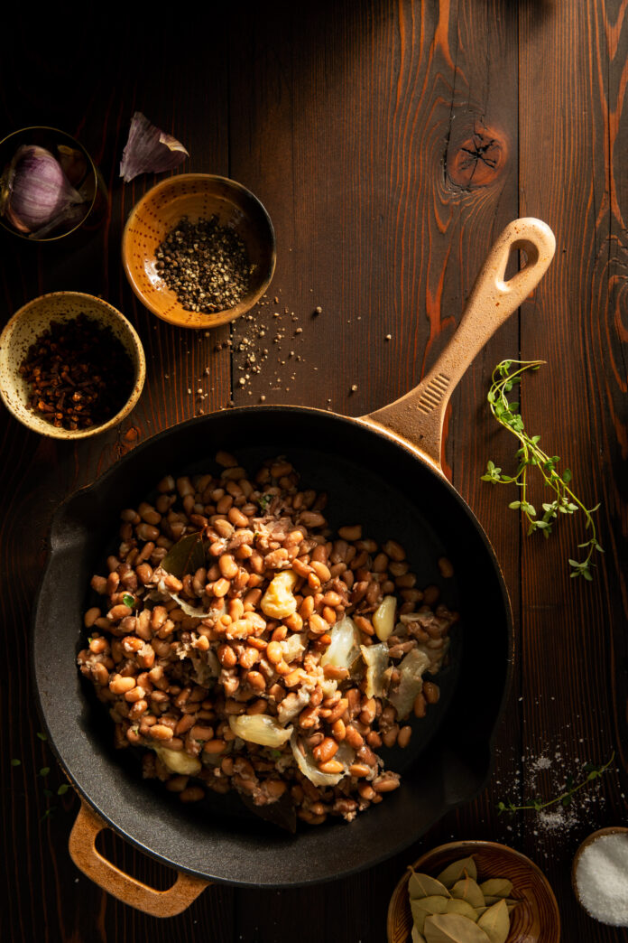pinto bean recipe recipe A cast iron skillet of beans. a pinto bean recipe