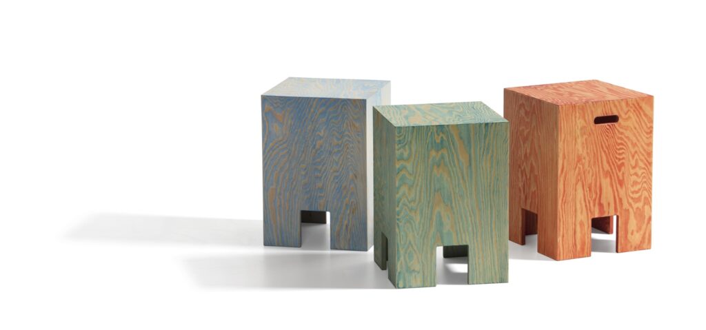 three side tables made of recycled plywood 