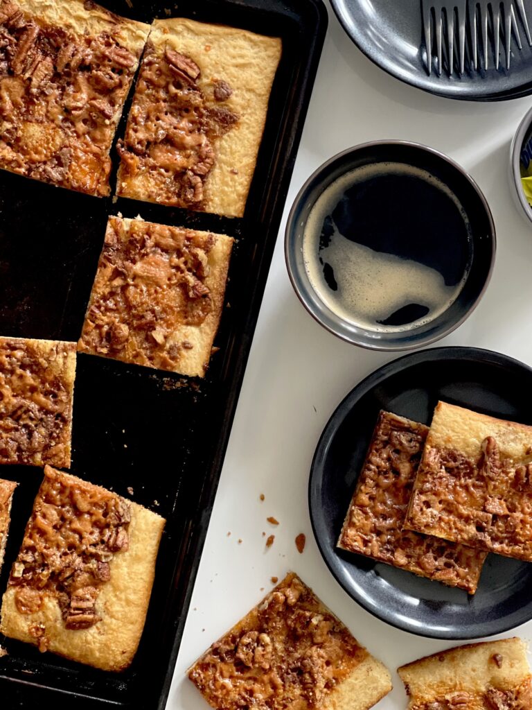 An aerial shot of Butterfinger Pecan Crumble Coffee Pastry on a baking sheet