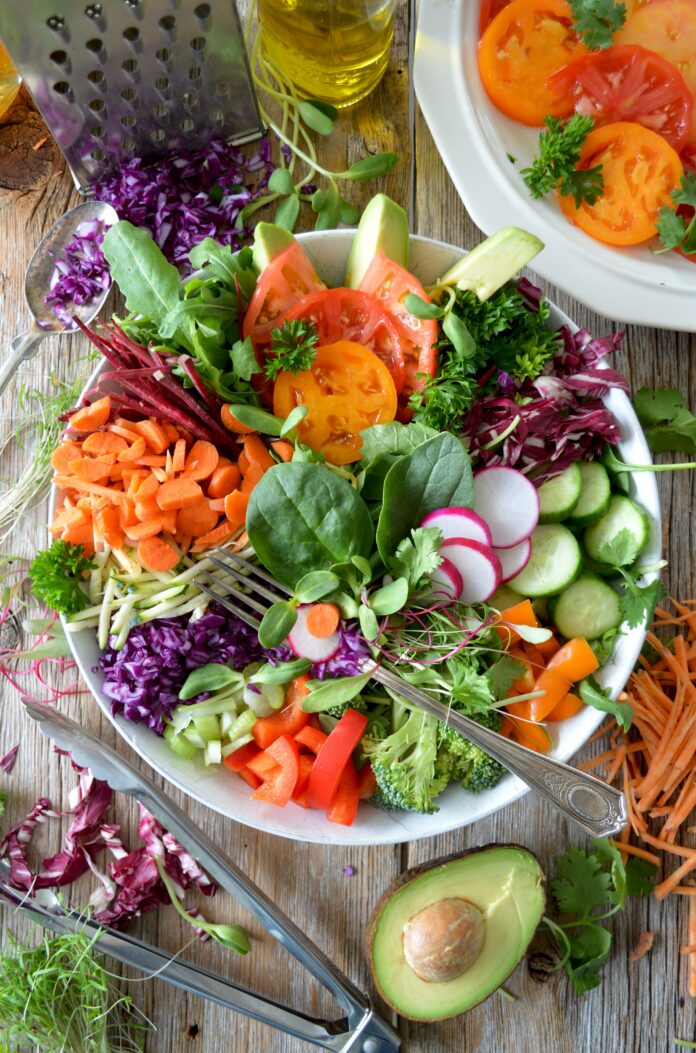 A bowl filled with colorful and various veggies. get kids to eat veggies
