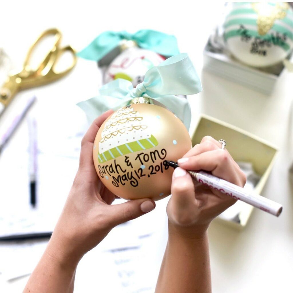 A person personalizes an ornament at a local business in Mount Lebanon Pittsburgh