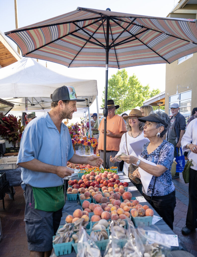 Hue Chan Karels, Open Kitchen cooking class based on Farm Fresh Journey, The Santa Fe Farmers Market Cookbook. Hue Chan and particpants at Santa Fe Farmers Market, cooking at Open Kitchen, and prepared food dishes..