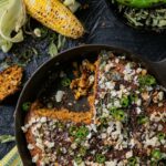 A delectable and unique cornbread recipe by Vishwesh Bhatt, featuring roasted corn, charred jalapeños, and a medley of spices. Baked to perfection in a cast-iron skillet, this flavorful Southern classic with Gujarati influences is a culinary delight.
