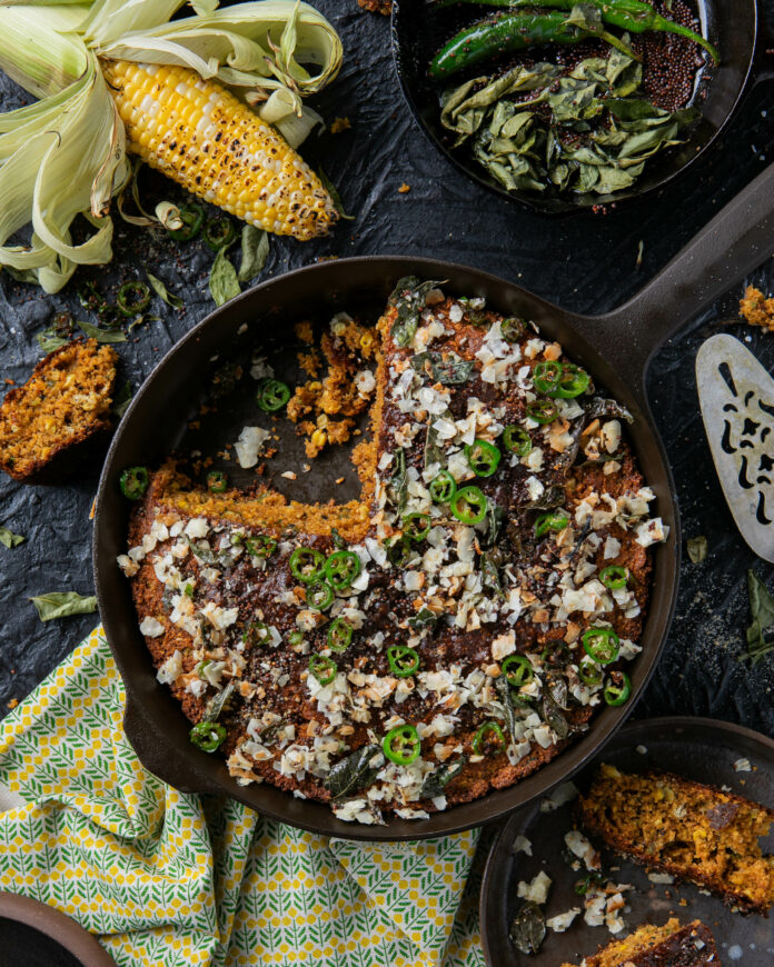 Vishwesh Bhatt Recipe A unique and flavorful cornbread recipe by Vishwesh Bhatt, combining Southern tradition with Gujarati influences, featuring roasted corn, charred jalapeños, and a fragrant blend of spices, baked to perfection in a cast-iron skillet.