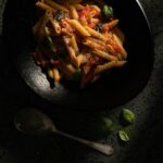 A dish of Hugo's Favorite Marinara Sauce pasta in a black bowl made by Victoria Sande.
