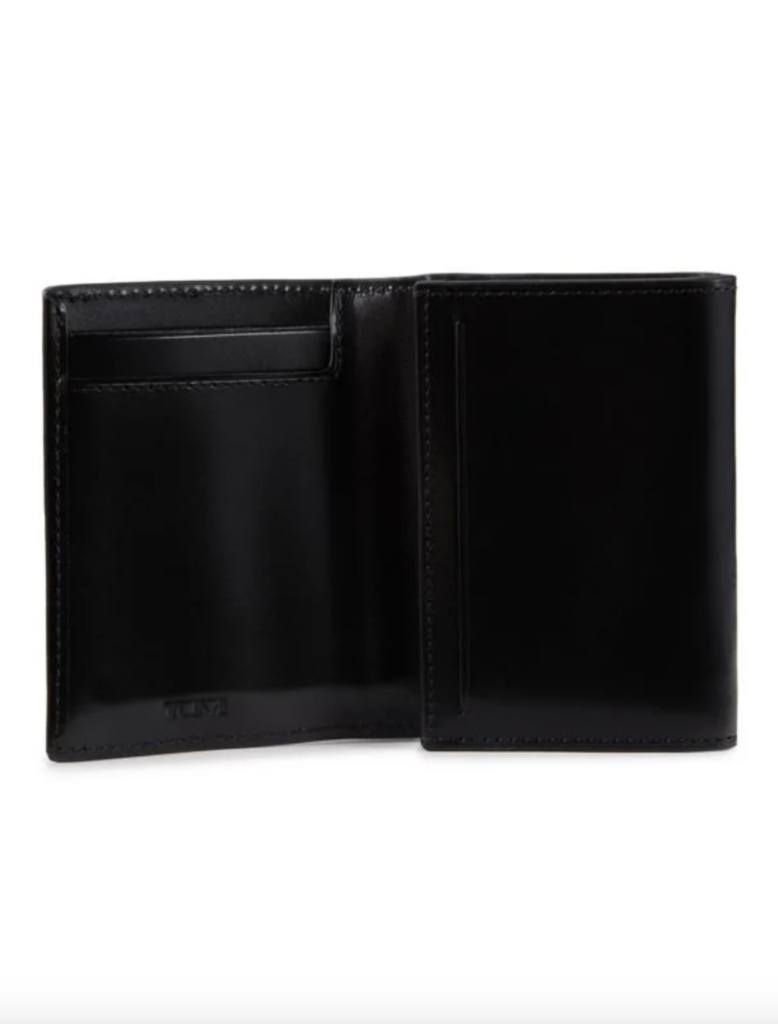 A sleek black wallet is opened in a bi-fold shape with card slots on the inside against a white background.