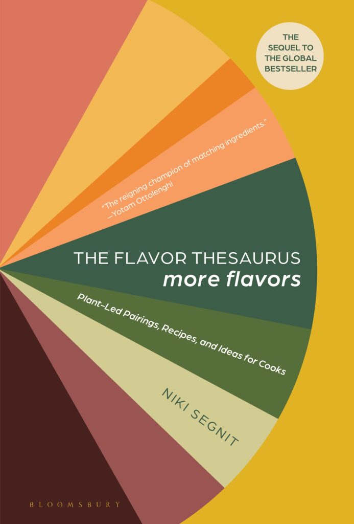 A cookbook cover features a colorful flavor wheel over a dark yellow background.