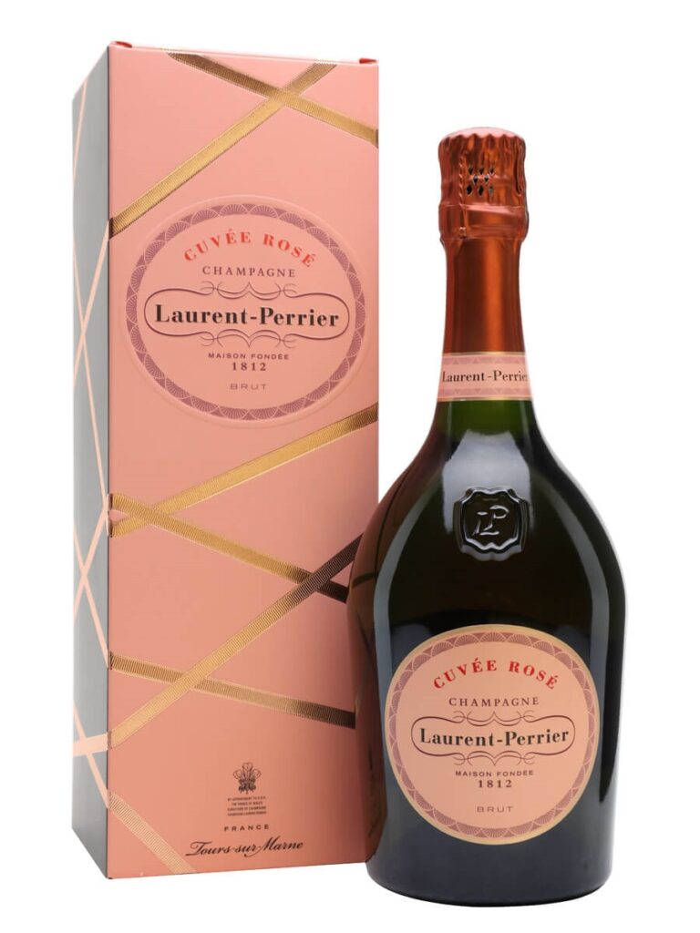 A bottle of rose with a pink label sits beside a pink box with gold wrapping embellishments around it.