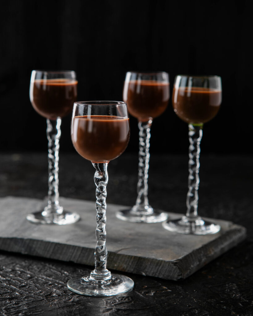 A rich blend of Ghirardelli chocolate, cream, and Everclear - the perfect boozy indulgence for sipping or drizzling over desserts.