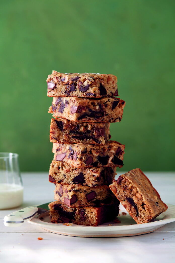 Dirty-Blondies Dirty Blondies with Chocolate, Hazelnut & Coffee - Decadent and chewy blondies loaded with chocolate chunks and toasted hazelnuts
