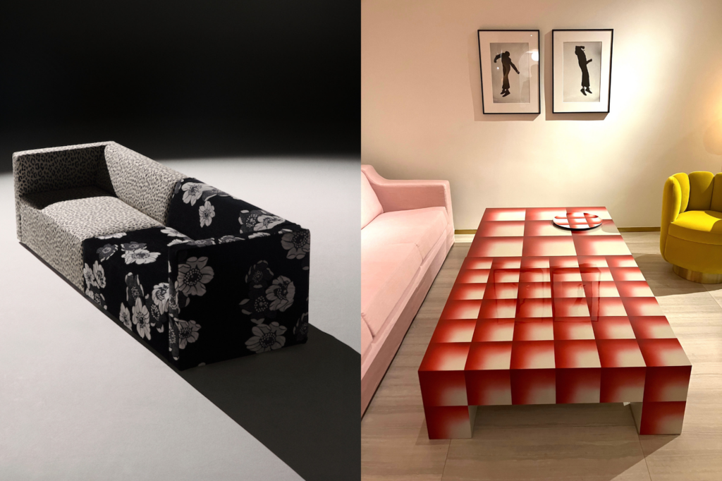 On the left is a couch that's half grey in color and half black and white flower patterns. On the right is a table that has red block patterns facing different directions in a living room.