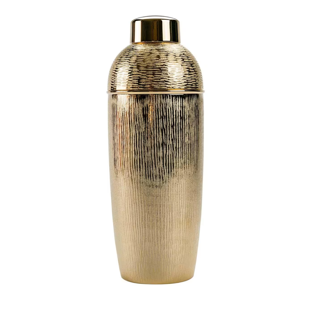 A golden cocktail shaker from Zanetto Barware sits on a blank background.
