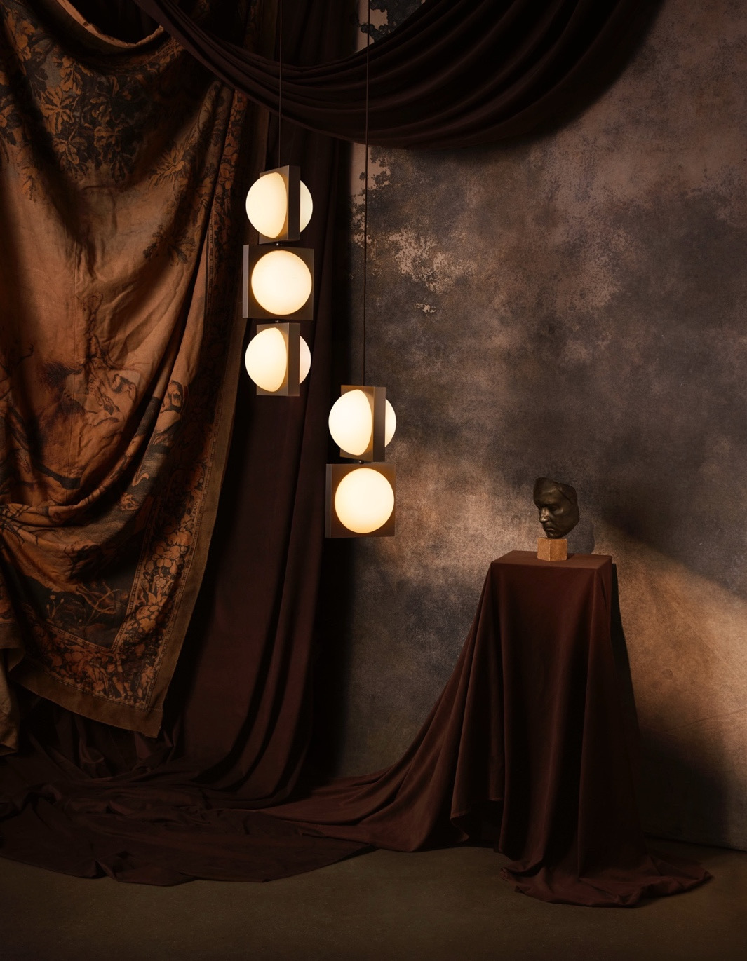 One of Lee Broom's designs, SOLSTICE, on a backlit, sultry stage.