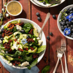 A fresh summer salad with blueberries and blue cheese.