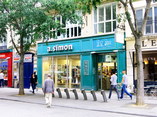 The exterior of A. Simon in Paris on a sunny day