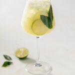 An absinthe spritz on a white background