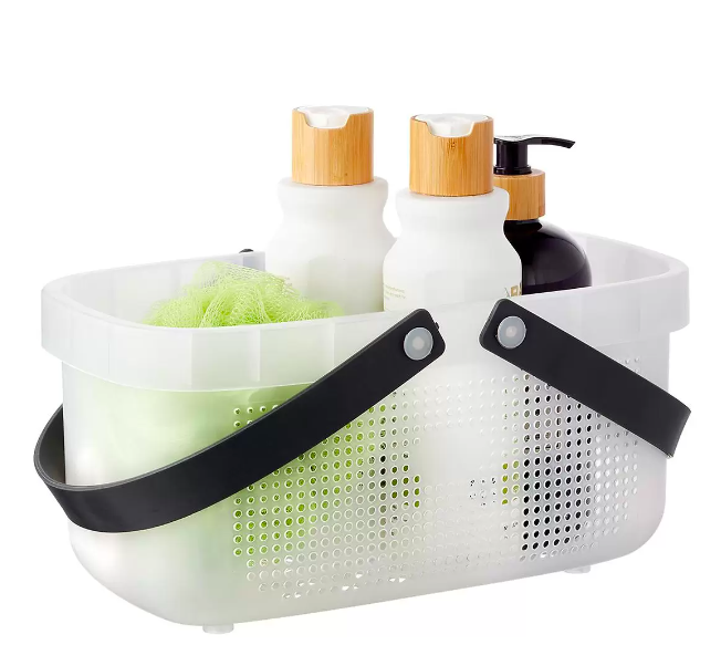 A shower caddy from The Container Store with some small items in it 