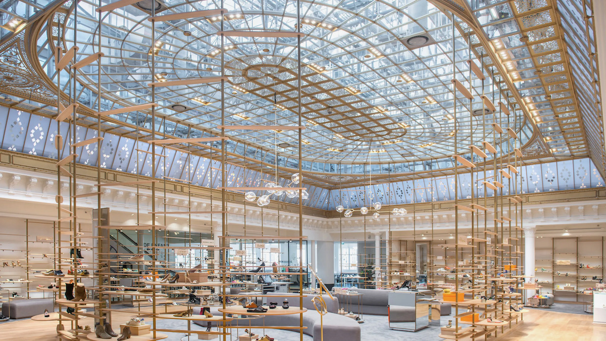 The lit-up interior of the glamorous store, Le Bon Marche 