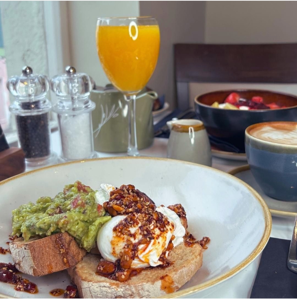 A breakfast spread with a mimosa