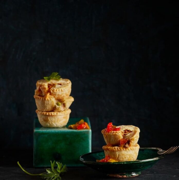 Mini-Pot-Pies Mini pot pies filled with savory ingredients and topped with a golden, flaky crust. A comforting and satisfying meal option.
