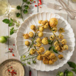 A plate of Southern-fried green cherry tomatoes, paired with remoulade