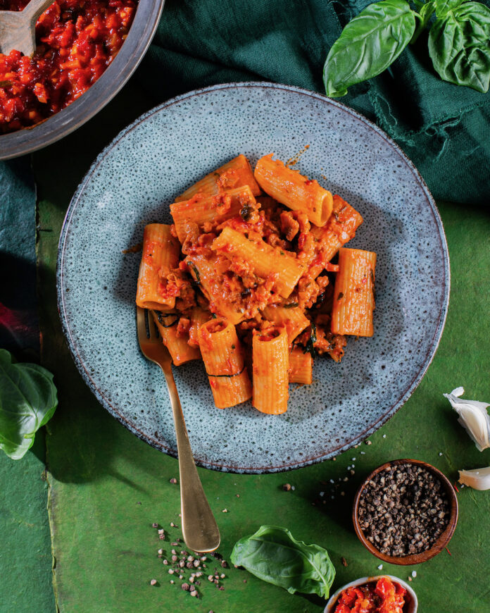 A plate of rigatoni with tomato sauce, inspired by Stanley Tucci