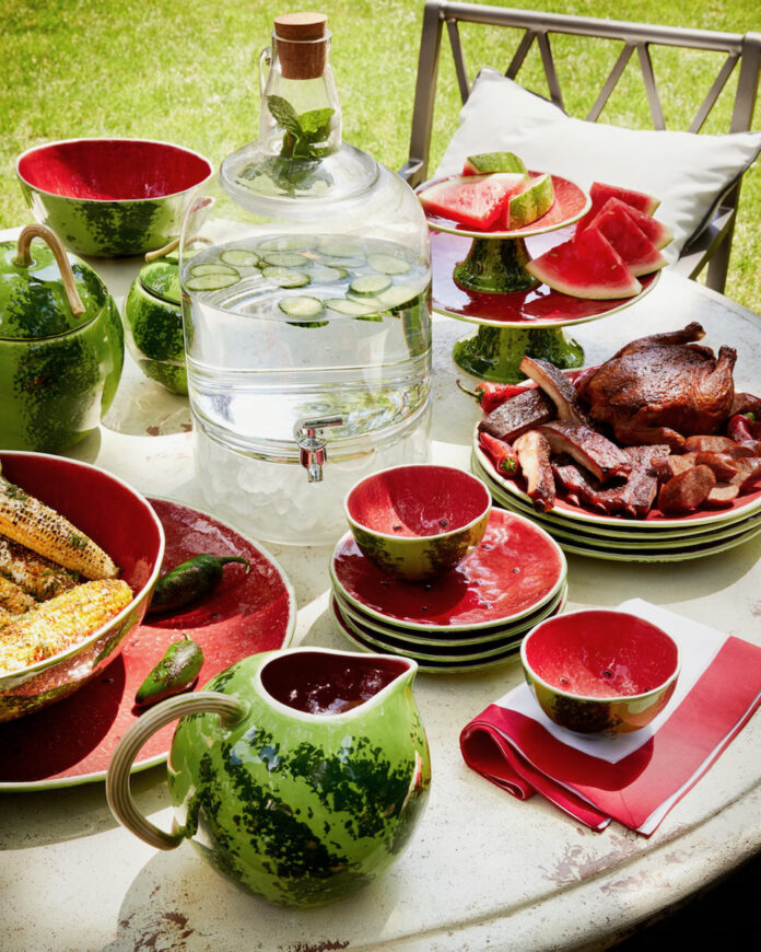 A table set with watermelon decor for summer